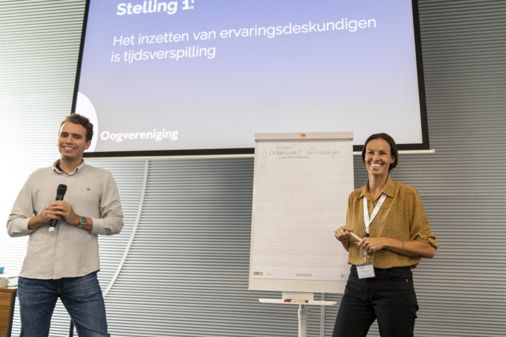 Een PowerPoint presentatie met de stelling: 'het inzetten van ervaringsdeskundigen is tijdsverspilling'. Deze stelling is besproken tijdens een workshop over de inzet van ervaringsdeskundigen